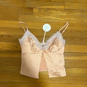 Revolve going out top